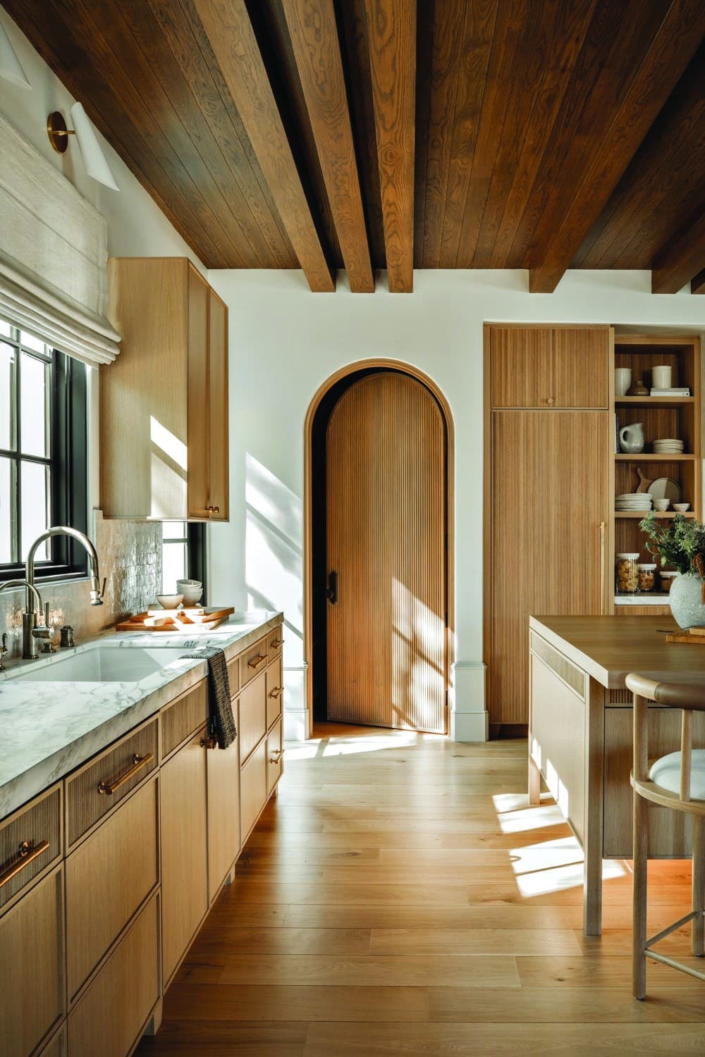 Arched wood kitchen